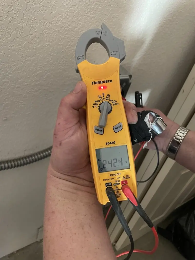 Voltage testing with clamp meter during Aluminum Wiring Replacement in Williamstown